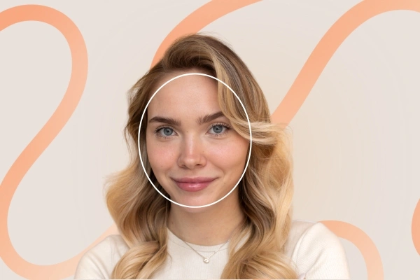 Smiling woman with circular outline highlighting full cheeks and soft jawline – round face