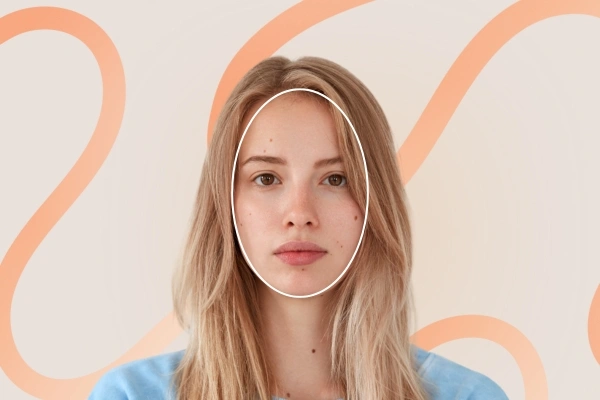 Young woman with oval outline demonstrating ideal balance & soft taper – oval face