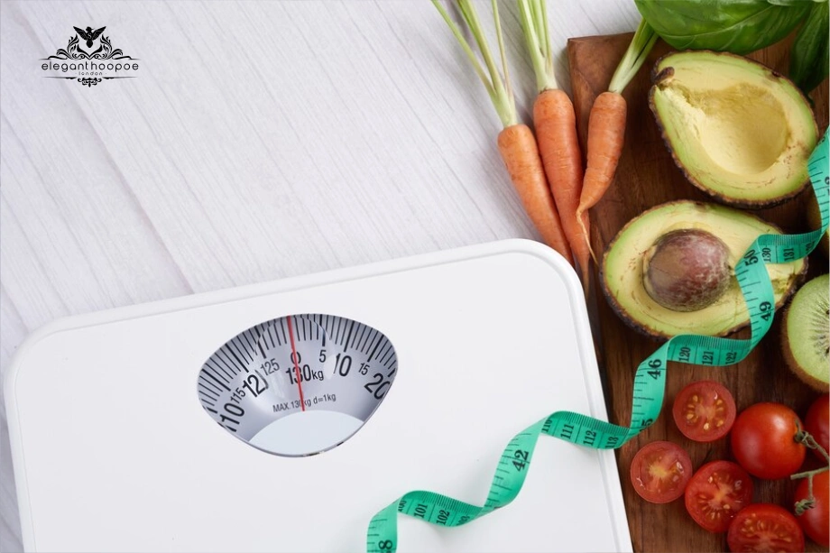 Analog bathroom scale surrounded by vegetables and measuring tape showing what you need to calculate BMI