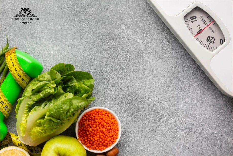 Lettuce, apple, weights & scale framed for weight-loss theme