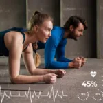 Man and woman holding plank position while BMI body-composition graphics display muscle-fat ratios