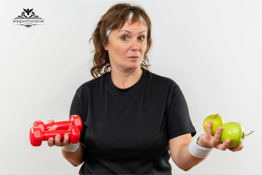 Middle-aged woman weighing dumbbell vs apples for BMI and Age