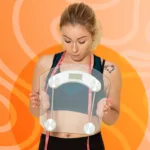 Woman holding a scale and wearing a measuring tape, representing alternative body fat measurement methods like BAI