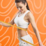 Fit woman in sports attire measuring her waist and chest with a tape measure, symbolizing muscle mass tracking for ideal weight management in athletes
