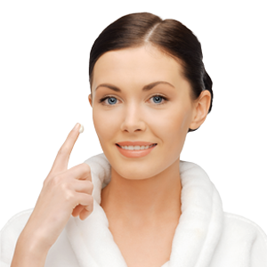 Close-up of individual pointing to their cheek, highlighting facial skin rejuvenation benefits like improved tone and radiance.