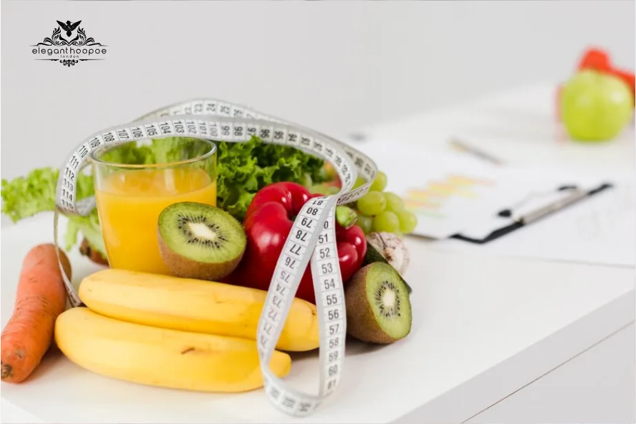 Colorful fruits and vegetables with a measuring tape and health chart demonstrating Body Mass Index calculations.