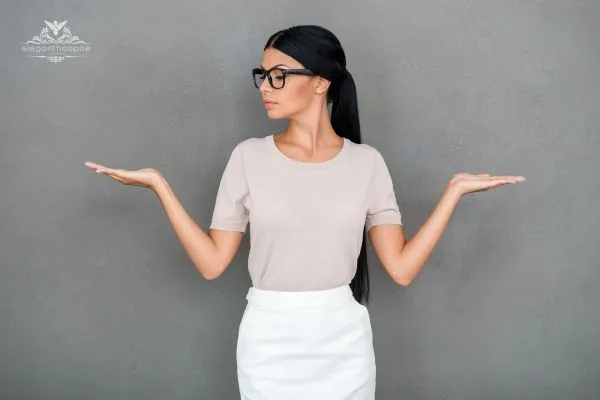 Woman with closed eyes and light makeup, with her hands stretched on both sides, symbolizing mindful self-reflection and holistic health awareness.