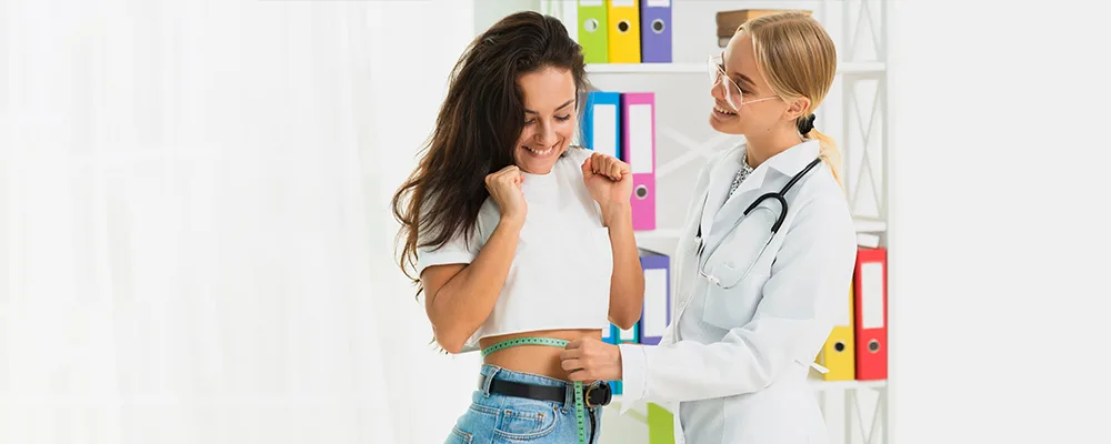 Healthcare professional measuring waist circumference to illustrate precise body composition analysis