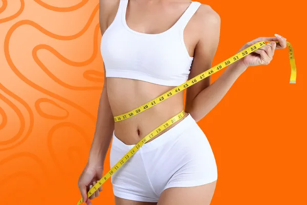 Person in white sportswear measuring waist circumference with a yellow tape measure against an orange backdrop to illustrate body mass ratio