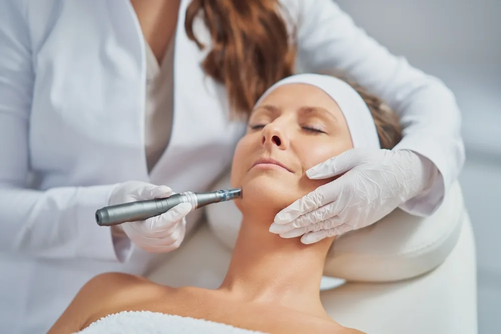 Patient receiving skin revitalization treatment at elegant hoopoe Clinic in Dubai, UAE.